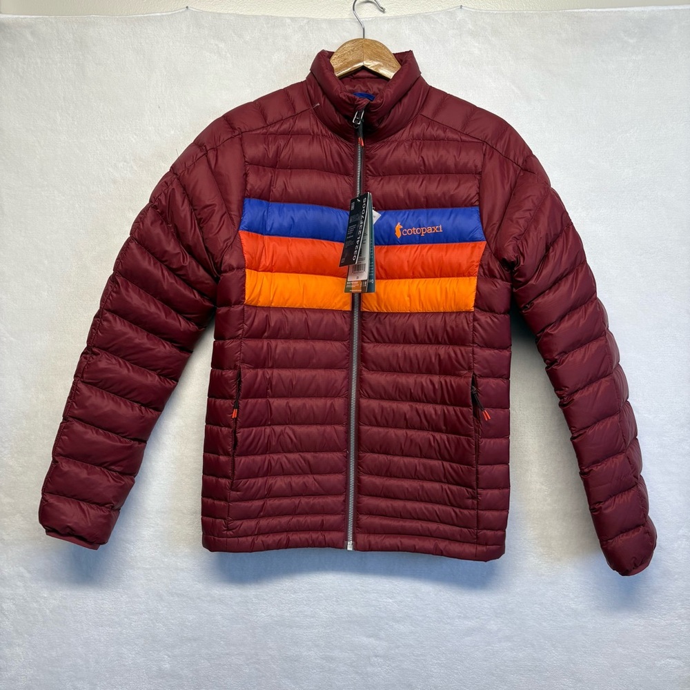 Cotopaxi Burgundy Puffer Jacket with Blue and Orange Accents